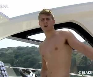 Young British guy masturbates on the yacht